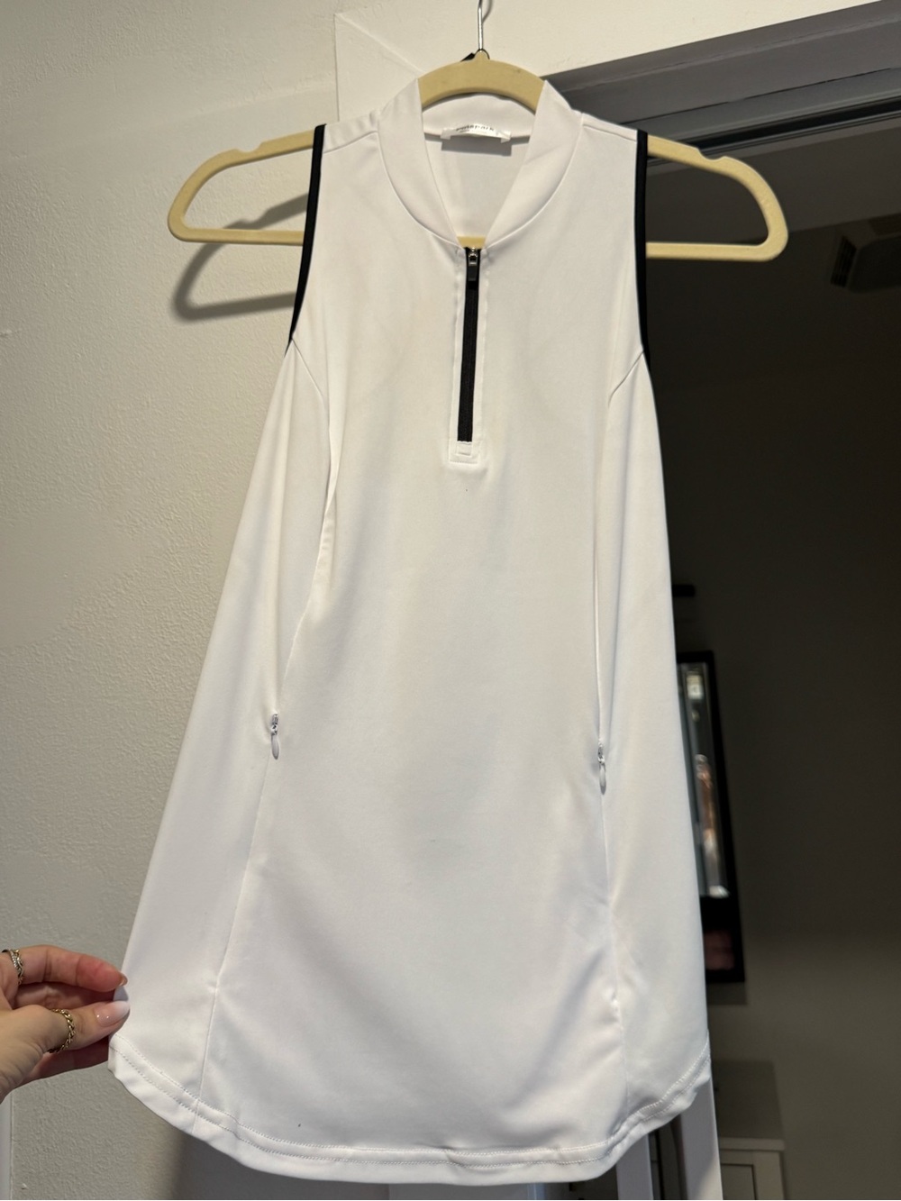 Sleeveless White Athletic Zip-Front Top with Black Trim and zip pockets. Small